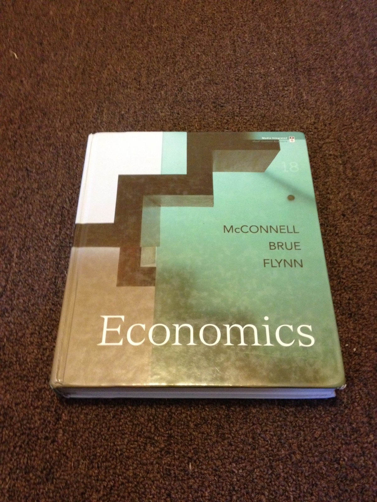 Economics (McGraw-Hill Economics) 18th Edition – hardcover McConnell,Campbel…