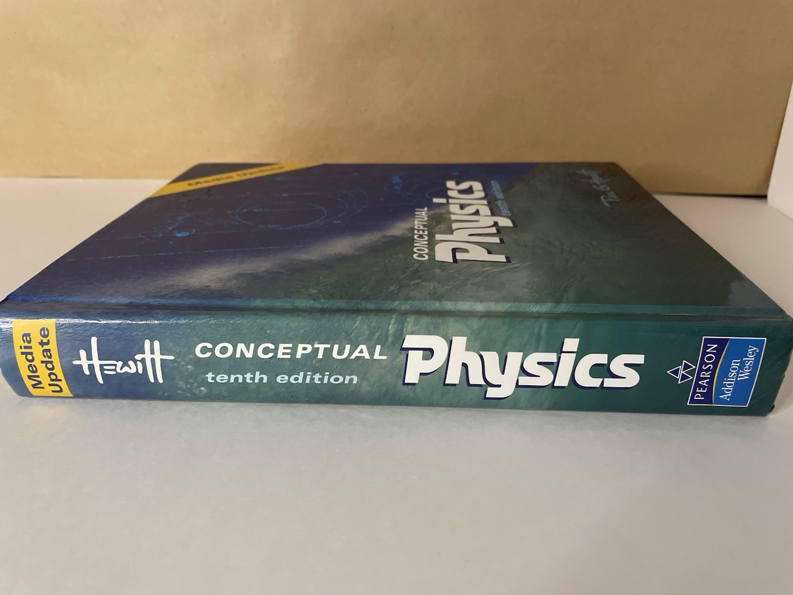 Conceptual Physics Textbook by Paul G. Hewitt (2009, 10th Edition) USED