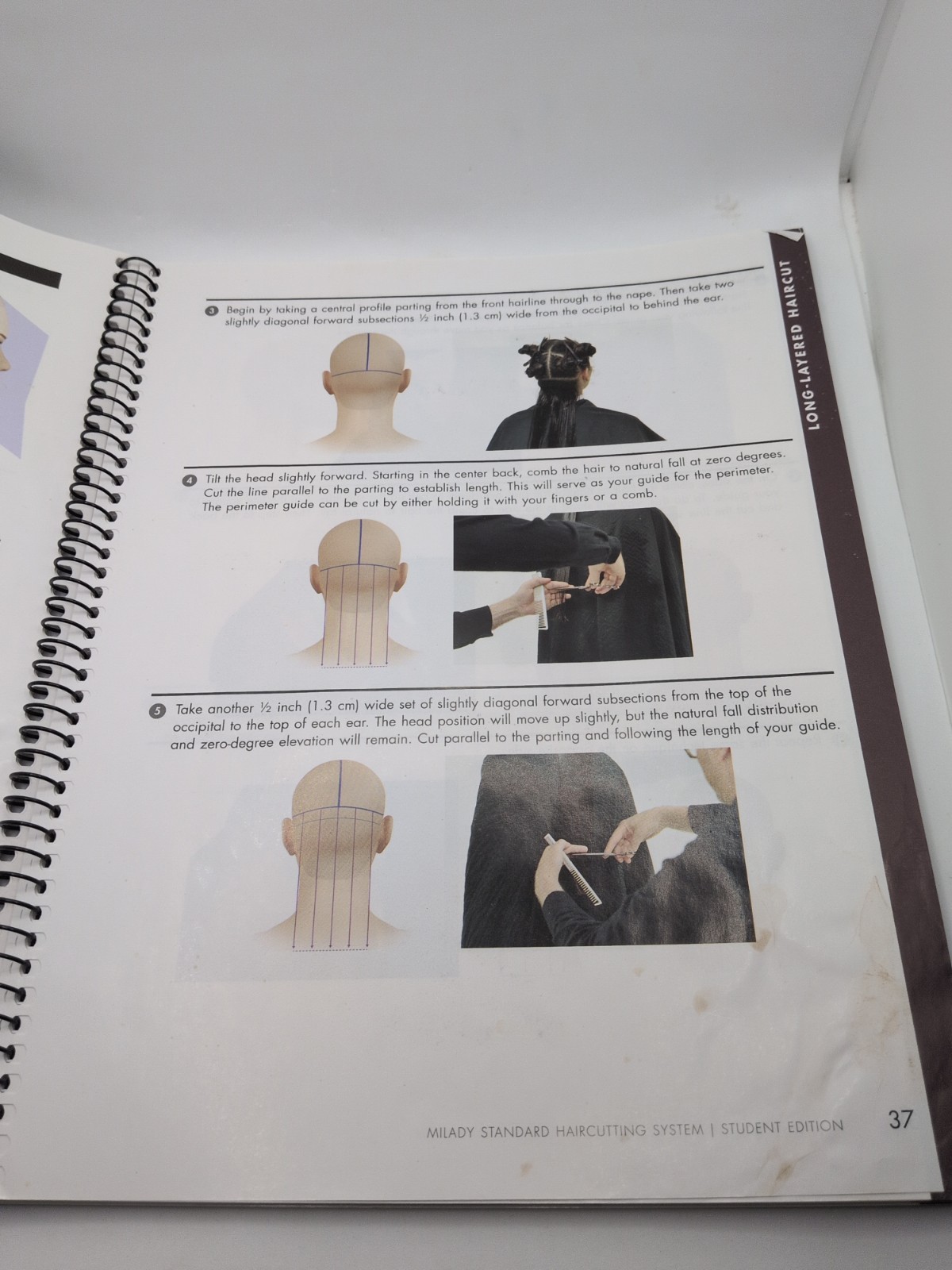 Milady Standard Haircutting System, Spiral bound Version by Milady