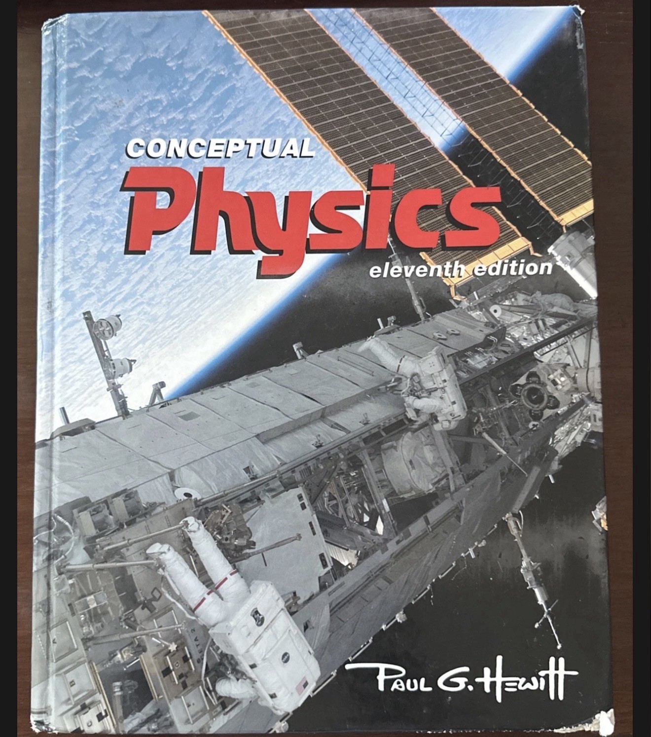 Conceptual Physics Eleventh Edition by Paul G. Hewitt Hardcover Physics